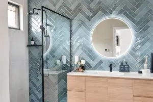 custom cut mirror in a bathroom in a Mount Macedon home