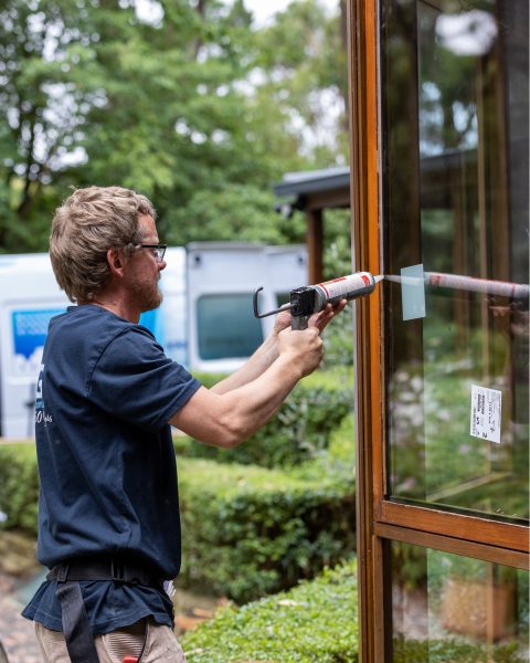 Macedon Ranges glazier installing retrofit double glazed windows in a Gisborne home